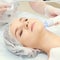 Facial micro current cosmetology procedure. Beauty technology treatment. Woman face therapy