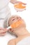 Facial orange alginate mask applying