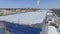 Factory Building Snowbound Roof and Yard Aerial View