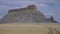 Factory Butte is a summit in Wayne County, Utah, in the United States