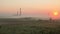 Factory at dawn in the mist timelaps