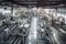 a factory floor full of automated machines that assemble and inspect products