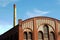 Factory floor and smokestack in old gasworks