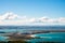 Factory on the island close to the beach and ocean. Above view. Bluff, New Zealand I