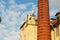 Factory pipe and facade of an old building