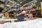 Factory Worker And Manager Checking Goods On Production Line