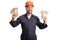 Factory worker wearing a protective helmet and goggles and holding stacks of money