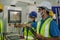 Factory workers and technician having working brief from foreman