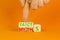 Facts or myths symbol. Concept word Myths and Facts. Beautiful orange table orange background. Businessman hand. Business and