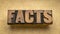 Facts word abstract in wood type - data, information and evidence concept