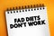 Fad Diets Don`t Work text on notepad, concept background