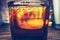Faded Image of a Glass of Whiskey and Coke Drink with Big Ice Cube