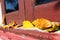 Faded leaf at wooden window