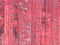Faded painted red peeling barn cabin rural countryside wooden board fence vintage fencing retro weathered
