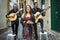 Fado band performing traditional portuguese music on the street