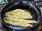 Fafda -gujrati snack breakfast being fried in a shop