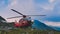 Fagaras, Arges/Romania - 08/02/2020: Rescue helicopter on top of the mountain trying to land urgently to save a climber