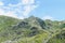 Fagaras mountains, Carpathians with green grass and rocks, cloud