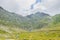 Fagaras mountains, Carpathians with green grass and rocks, Trans