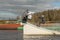 Fagersta, Sweden - Maj 01, 2020: Two teenagers wakeboarders on a lake during a physical education lesson. makes an extreme jump on