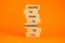 Failing to plan or planning fail symbol. Wooden blocks with words Failing to plan is planning to fail. Beautiful orange background