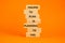 Failing to plan or planning fail symbol. Wooden blocks with words Failing to plan is planning to fail. Beautiful orange background