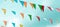 Fair flag bunting colorful background hanging on blue sky for fun fiesta party event, summer holiday farm feast celebration