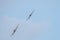 FAIRFORD, UK, JULY 13 2018: A photograph documenting two De Havilland Vampire aircraft performing a pair display at RAF