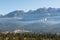 Fairmont Hot Springs, Canada - March 21 2019: panorama view to small town at the foot of a high mountain range