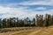 FAIRMONT HOT SPRINGS, CANADA - MARCH 22, 2019: Golf Course field in small town in rocky mountains sunny afternoon