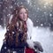 Fairy tale girl in sheepskin coat in magic forest.