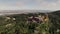 Fairy tale hilltop castle, colourful Pena Palace. Natural Park Sintra, Portugal. Scenic aerial view