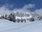 Fairytale alpine winter atmosphere and snow-capped alpine peak Stockberg 1781 m in the Alpstein mountain massif, Nesslau