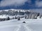 Fairytale alpine winter atmosphere and snow-capped alpine peak Stockberg 1781 m in the Alpstein mountain massif, Nesslau