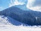 Fairytale alpine winter atmosphere and snow-capped alpine peak Stockberg 1781 m in the Alpstein mountain massif, Nesslau