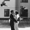 Fairytale beautiful sexual bride kissing handsome groom with birds flying b&w