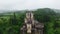 Fairytale castle in middle of mysterious forest