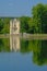 Fairytale castle of the white queen next to a lake in Coye-la-ForÃªt