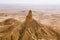 The Faisal`s Finger rock near Riyadh, Saudi Arabia, a view from Jabal Tuwaiq escarpment.