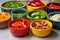fajita ingredients stored in separate colorful bowls