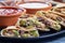 Fajita quesadilla with pieces of beef steak, green bell pepper, onion and cheese, horizontal closeup