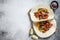 Fajitas with beef meat stripes, colored bell pepper and onions, served with tortillas and salsa. White background. Top view. Copy