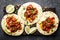 Fajitas in tortillas with fried shrimps, bell peppers and onion