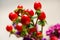 Fake berries flower arrangement macro photo