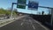 Fake drone shot. The camera flies over a car suburban highway