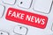 Fake news truth lie media internet button online computer keyboard