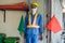 Fake traffic mannequin in the clothes of a road worker