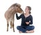 Falabella miniature horse and girl