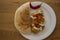 Falafel - authentic food of Israel. Plate of falafels with tahini sauce and chili pepper.