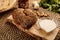 FALAFEL balls with raita served in a wooden board isolated on wooden table background side view of appetizer